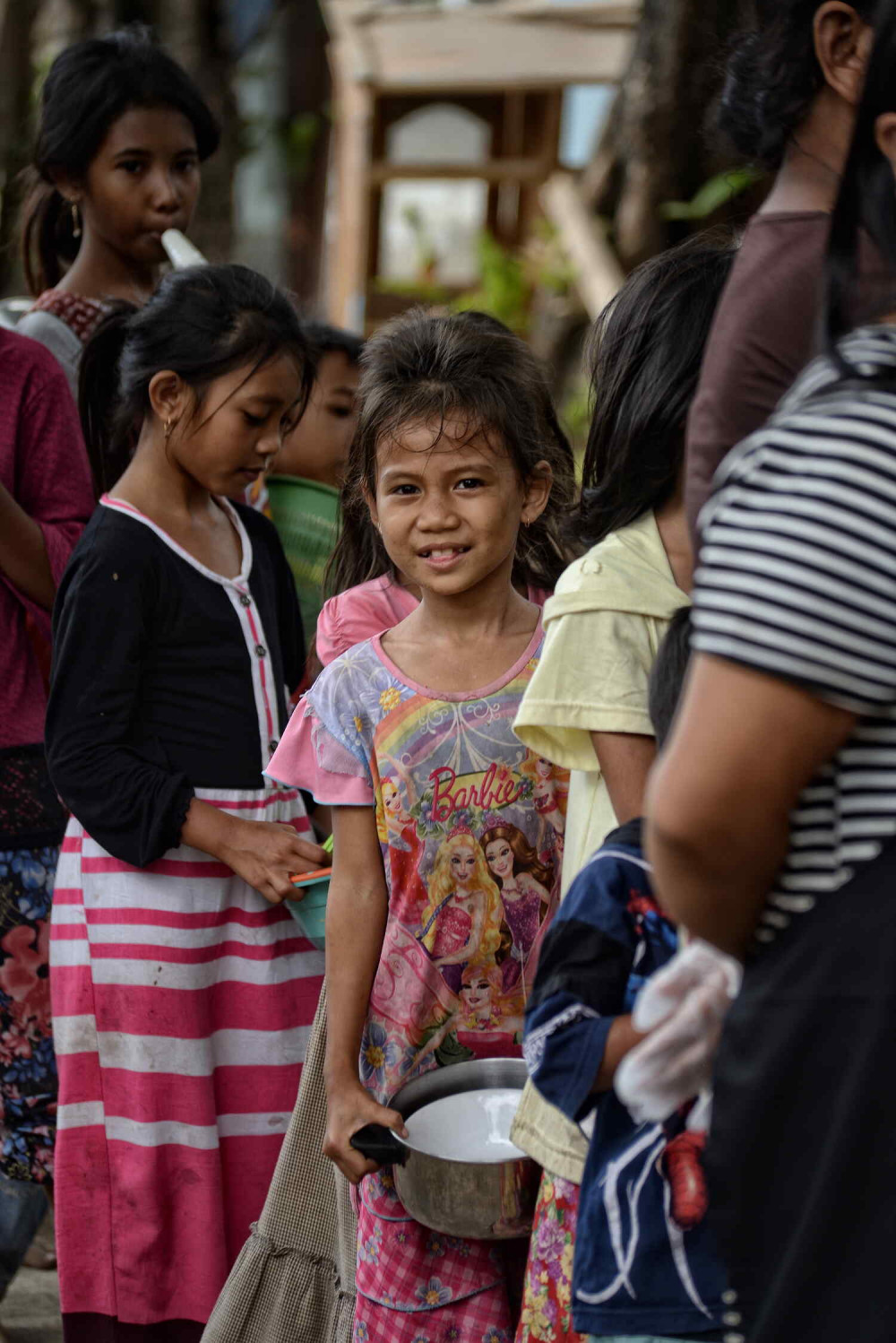 Children are waiting in line for food provided by World Central Kitchen Organization