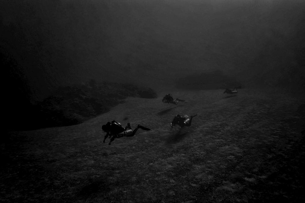 Underwater shoot with Technical Divers in moon scenery