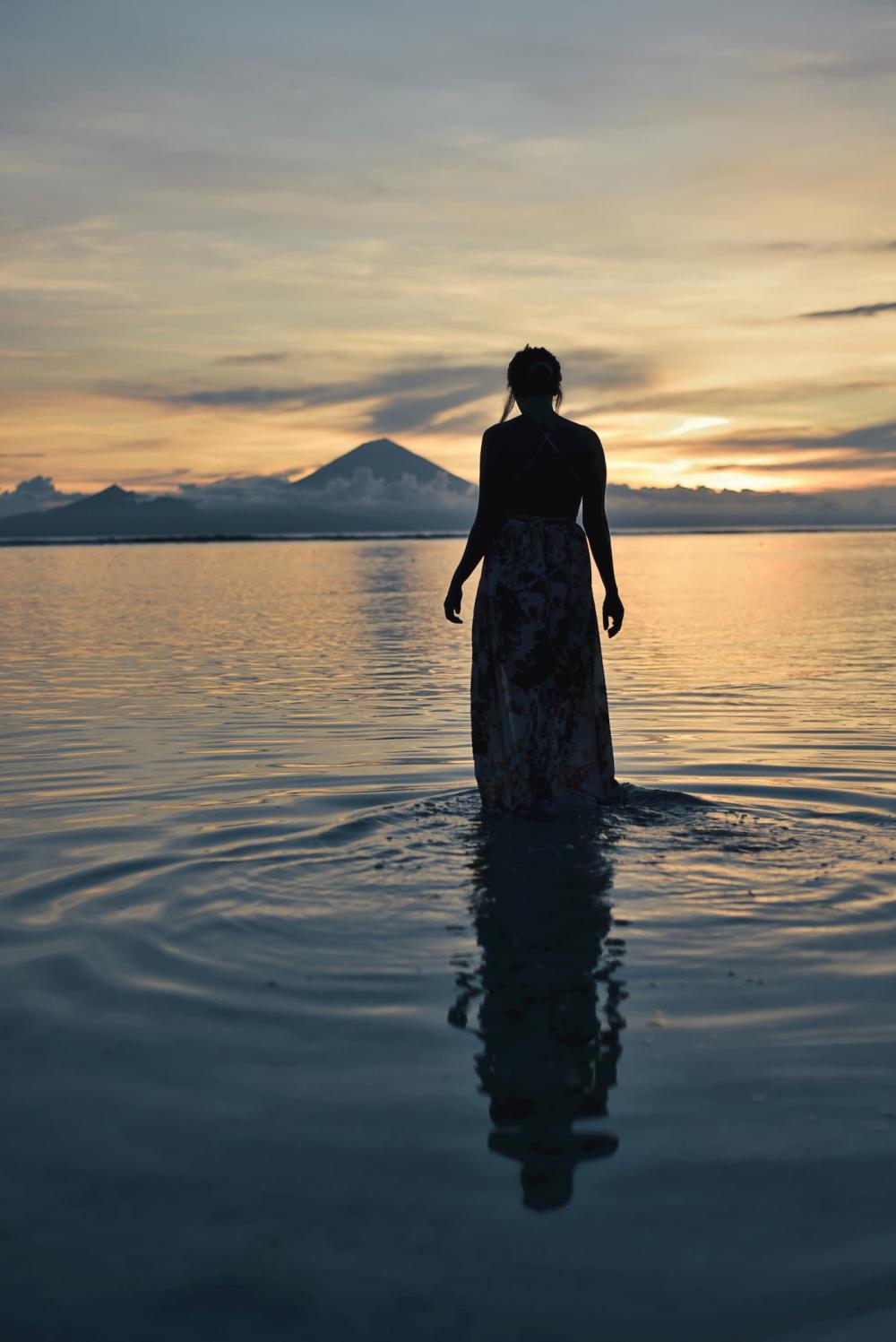 Sunset photoshoot with Georgina. In the background volcano Mt Agung in Bali