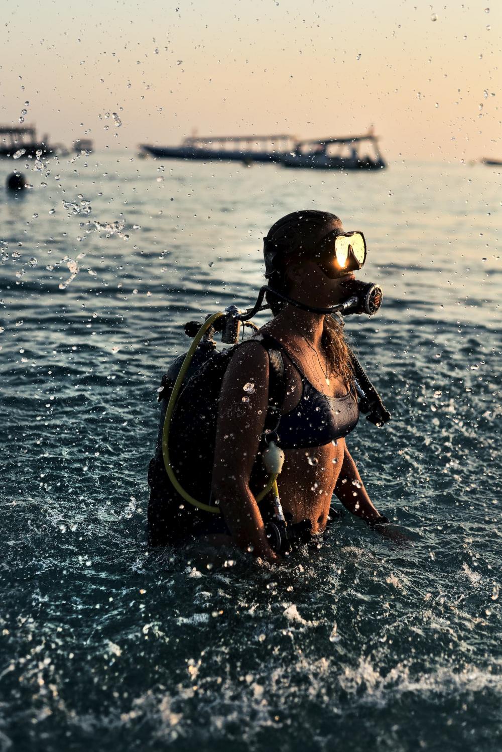 Scuba Diver covered in Water Drops