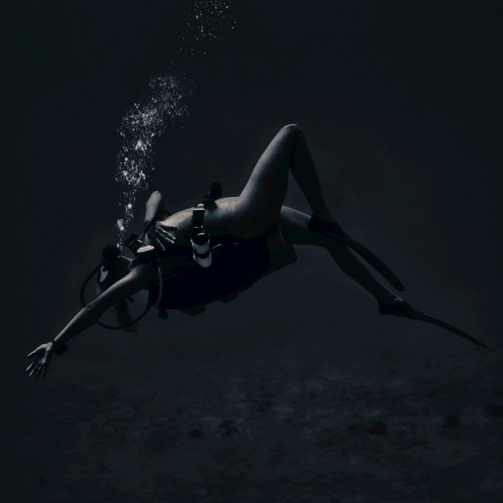 Naked underwater photoshoot. Black and White