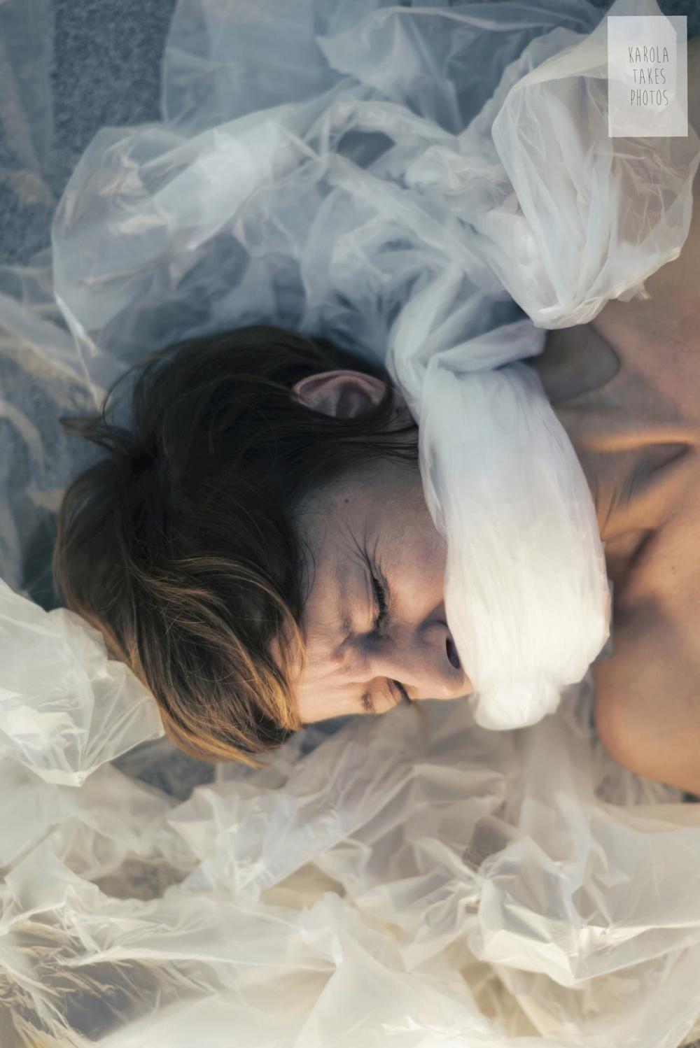 Sian trapped in plastic sheet